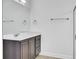 Bright bathroom with a large mirror, vanity, and a shower with glass doors at 102 Brutus Ln, Summerville, SC 29485