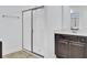 Modern bathroom features a shower with glass door, sleek vanity, and neutral tile flooring at 102 Brutus Ln, Summerville, SC 29485
