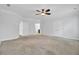 Large bedroom with carpet, ceiling fan and open doorways to adjoining rooms at 102 Brutus Ln, Summerville, SC 29485