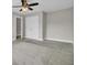 Neutral bedroom featuring wall-to-wall carpet, a ceiling fan, and a closet at 102 Brutus Ln, Summerville, SC 29485