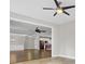 Spacious living room open to the kitchen, dining room with hardwood floors and a ceiling fan at 102 Brutus Ln, Summerville, SC 29485