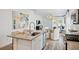 Beautiful kitchen featuring granite countertops, modern appliances, a kitchen island, and a dining area at 1025 Swamp Rose Run, Summerville, SC 29485