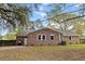 Brick house exterior with a fenced yard and well-maintained lawn at 103 Beverly Dr, Ladson, SC 29456