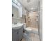 Modern bathroom with a gray vanity, a toilet, and a glass enclosed shower at 103 Beverly Dr, Ladson, SC 29456