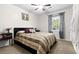 Bedroom featuring a window for natural light, a ceiling fan, and carpeted floors at 103 Beverly Dr, Ladson, SC 29456