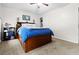 Comfortable bedroom with a large bed, ceiling fan, and neutral colored walls at 103 Beverly Dr, Ladson, SC 29456