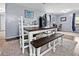 Farmhouse dining table set in a well-lit space, perfect for Gathering gatherings at 103 Beverly Dr, Ladson, SC 29456