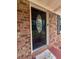 Charming front door with glass insert and welcome decoration at 103 Beverly Dr, Ladson, SC 29456