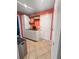 Kitchenette area with modern cabinetry and wood shelves, brightly lit with tile floor at 103 Beverly Dr, Ladson, SC 29456