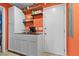 Kitchenette area with modern cabinetry and wood shelves is brightly lit and well-appointed at 103 Beverly Dr, Ladson, SC 29456