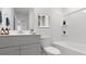 Clean bathroom with shower, modern fixtures, and nice cabinet with a large mirror at 1031 Swamp Rose Run, Summerville, SC 29485