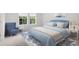 Comfortable bedroom with a reading chair, a blue color scheme, and large windows at 1031 Swamp Rose Run, Summerville, SC 29485