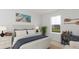 Nicely decorated bedroom with lots of light, a dresser, and wood accents at 1031 Swamp Rose Run, Summerville, SC 29485