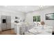 Modern kitchen with stainless steel appliances, a large island, and an adjacent dining area at 1031 Swamp Rose Run, Summerville, SC 29485