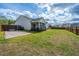 The large backyard is fully fenced and has a section covered with gravel at 104 Cranston Ln, Summerville, SC 29483