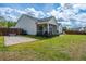A fenced backyard offers both a screened in porch and an open stone section covered with pea gravel at 104 Cranston Ln, Summerville, SC 29483