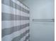 Gray and white striped shower curtain at 104 Cranston Ln, Summerville, SC 29483