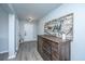 Welcoming foyer featuring hard surface floors, a wooden cabinet, and light gray walls at 104 Cranston Ln, Summerville, SC 29483