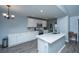 This kitchen features stainless appliances, a center island with sink, and ample cabinet space at 104 Cranston Ln, Summerville, SC 29483