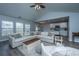 Sun-lit living room with view of backyard, features open layout and inviting decor at 104 Cranston Ln, Summerville, SC 29483