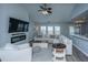 Relaxing living room complete with a modern fireplace, a mounted television, and neutral decor at 104 Cranston Ln, Summerville, SC 29483