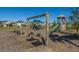 Community playground with swings and slides at 104 Cranston Ln, Summerville, SC 29483