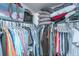 Spacious walk-in closet, with shelving, hanging rods, clothing, pillows, and storage at 104 Cranston Ln, Summerville, SC 29483