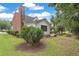 Spacious backyard with lush greenery, and mature trees offering shade at 105 N Gateshead Xing Xing, Goose Creek, SC 29445