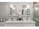 Contemporary bathroom boasting double vanity with square mirrors and modern lighting fixtures at 105 N Gateshead Xing Xing, Goose Creek, SC 29445