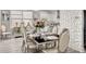 Elegant dining area with modern furnishings, flowing into the open-concept kitchen at 105 N Gateshead Xing Xing, Goose Creek, SC 29445