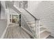 Elegant staircase with modern paneled walls, leading to the upper level of the home at 105 N Gateshead Xing Xing, Goose Creek, SC 29445