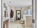 Bathroom featuring a soaking tub, shower, and a vanity area with decorative mirror at 113 Blackwater Way, Moncks Corner, SC 29461