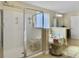 Bright bathroom featuring glass shower, soaking tub with accessories and a vanity in background at 113 Blackwater Way, Moncks Corner, SC 29461