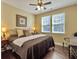 Warm bedroom with ceiling fan, natural light, and comfortable furnishings at 113 Blackwater Way, Moncks Corner, SC 29461
