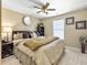 Comfortable bedroom with queen bed, ceiling fan, and a window at 113 Blackwater Way, Moncks Corner, SC 29461