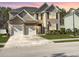Charming two-story home with a manicured lawn, a two-car garage, and a welcoming front entrance, radiating curb appeal at 113 Blackwater Way, Moncks Corner, SC 29461