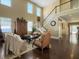Open-concept living room featuring a staircase, tall ceilings, and hardwood floors at 113 Blackwater Way, Moncks Corner, SC 29461