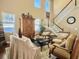 Sunlit living room boasting tall ceilings, staircase, and comfortable seating at 113 Blackwater Way, Moncks Corner, SC 29461