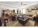 Open-concept living space with plush seating and view of the kitchen, great for entertaining at 113 Blackwater Way, Moncks Corner, SC 29461
