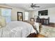 Cozy main bedroom featuring a king-size bed, natural light, and a comfortable seating area at 113 Blackwater Way, Moncks Corner, SC 29461