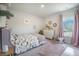 Charming bedroom with pink accents and dinosaur themed decorations at 1132 Mossy Rock Dr, Summerville, SC 29485