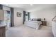 Spacious bedroom with carpet, a comfortable bed, and a crib at 1132 Mossy Rock Dr, Summerville, SC 29485