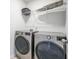 Well-lit laundry room with modern washer and dryer units at 1132 Mossy Rock Dr, Summerville, SC 29485