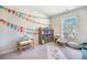 Bright playroom with colorful decorations, toys, and a window at 1132 Mossy Rock Dr, Summerville, SC 29485