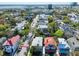 An aerial view of a neighborhood showcasing beautiful homes near a waterfront, indicating a desirable location at 125 Ashley Ave, Charleston, SC 29401