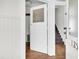 Welcoming entryway highlighting an open door with natural light and access to the staircase at 125 Ashley Ave, Charleston, SC 29401