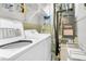 Clean laundry room with modern washer, dryer, and ample storage at 125 Ashley Ave, Charleston, SC 29401