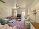 Cozy living room with comfortable sofas, a TV, and decorative details at 125 Ashley Ave, Charleston, SC 29401