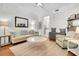 Cozy living room with hardwood floors, comfortable seating, and neutral decor at 125 Ashley Ave, Charleston, SC 29401