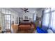 Bright main bedroom with wood floors, ceiling fan, large windows and ensuite bathroom at 125 Ashley Ave, Charleston, SC 29401